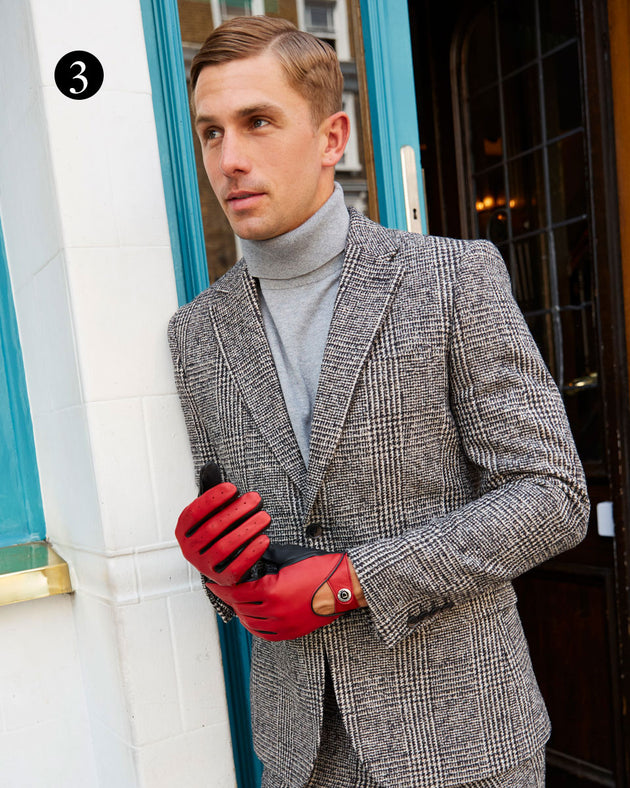 Man wearing heritage leather gloves in fireball out in the city