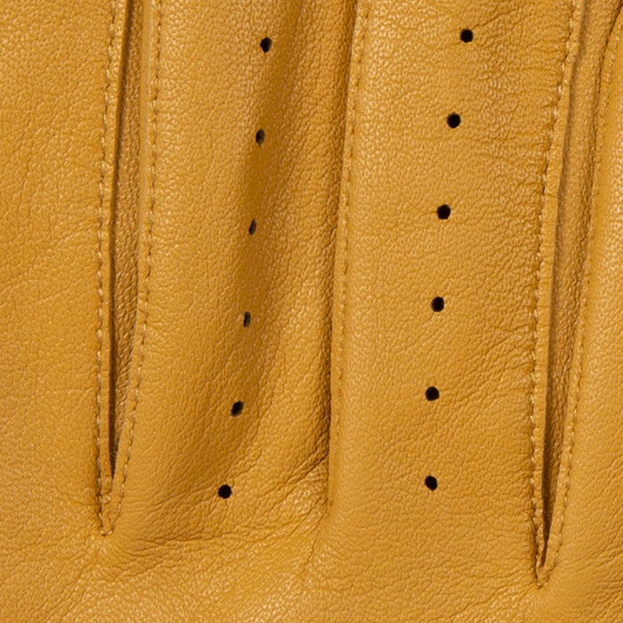 Men's classic leather driving gloves in cork with black pipping - close up of the stitching 