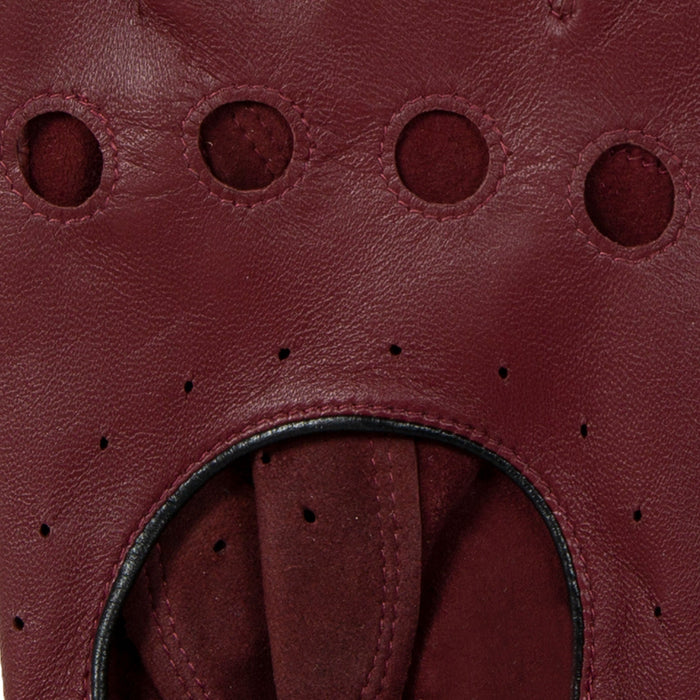 Men's leather driving gloves in Wine red with Black trim closeup knuckle
