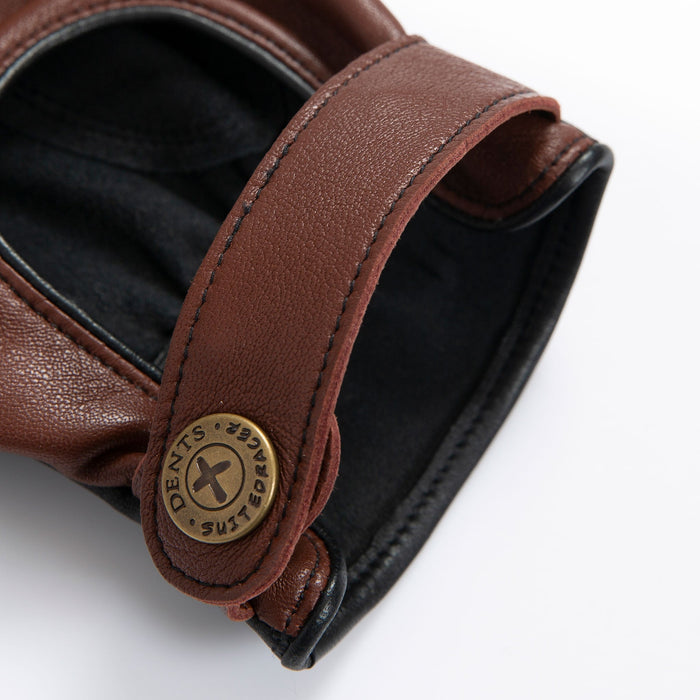 Men's The Suited Racer touchscreen leather driving gloves with wristwatch cut out in english tan close up of the strap