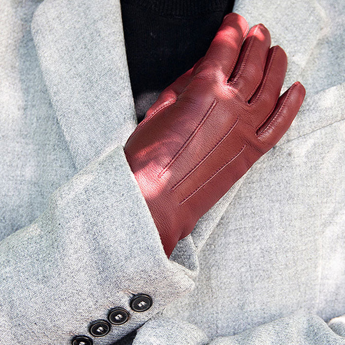 Woman wearing Women's Chestnut Three Point Lined Leather Gloves in the park