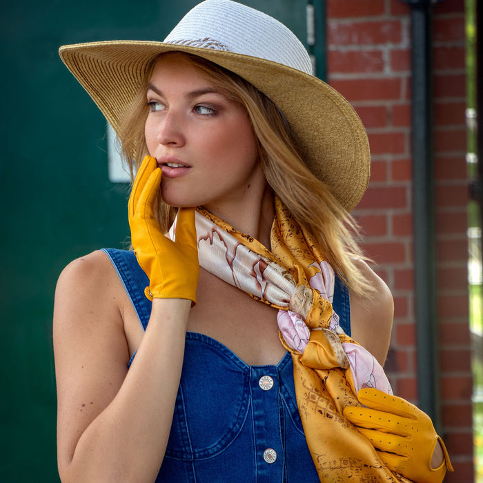 Woman wearing Women's Lined Leather Driving Gloves Yellow